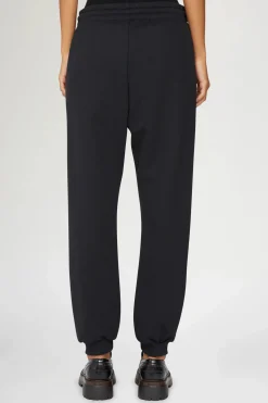 Pantaloni con logo
